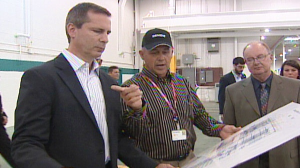 Ontario Premier Dalton McGuinty tours the Siemens Canada plant in Tillsonburg, Ont. on Monday, Aug. 8, 2011.