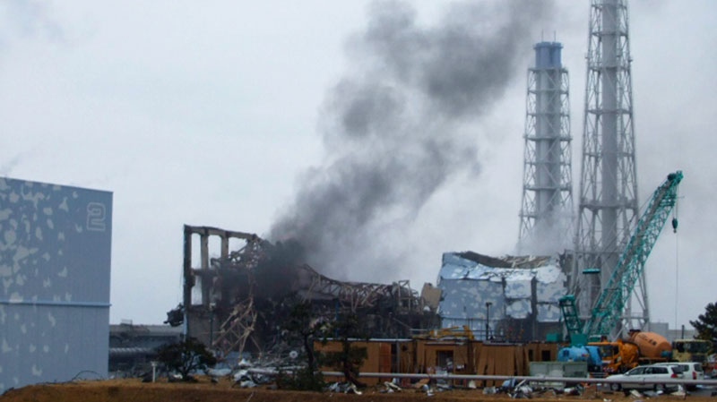 In this Monday, March 21, 2011 file photo released by Tokyo Electric Power Co., gray smoke rises from Unit 3 of the tsunami-stricken Fukushima Dai-ichi nuclear power plant in Okuma, Fukushima prefecture, Japan.  (AP / Tokyo Electric Power Co.)