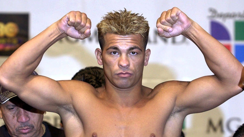 Canadian welterweight boxer Arturo Gatti of Montreal poses for photographers during his weigh-in at the MGM Grand Casino Hotel in Las Vegas, Nv., on March 23, 2001. (AP / Charles Rex Arbogast)