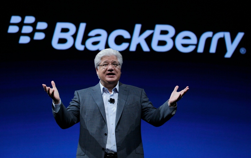 In this Oct. 18, 2011 file photo, Mike Lazaridis, co-CEO of Research in Motion gestures at the end of his keynote address to the BlackBerry DevCon Americas conference in San Francisco. Lazaridis and co-founder Douglas Fregin are weighing taking over the distressed smartphone company as it searches for a savior. (AP / Eric Risberg)