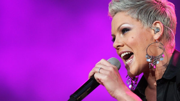 U.S. singer Pink performs on stage during the opening night of the UK Funhouse Summer Carnival stadium tour at the Stadium of Light, Sunderland, England, Friday, June 11, 2010. (AP / Scott Heppell)
