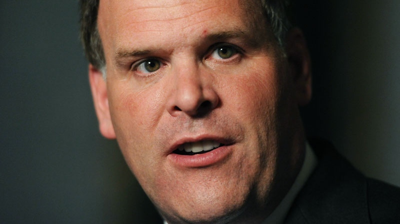 Minister of Foreign Affairs John Baird speaks to reporters in the Foyer of the House of Commons on Parliament Hill in Ottawa on Tuesday, July 5, 2011. Sean Kilpatrick / THE CANADIAN PRESS
