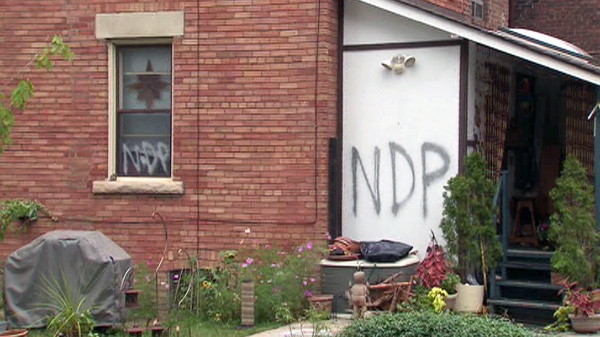 A house on Abbott Avenue, near Dundas Street West and Bloor Street West is shown after 'NDP' was spray painted on its door on Sunday, Aug. 14, 2011.