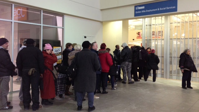 Residents line up for grocery gift cards