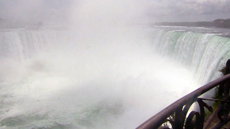 A woman is thought to have drowned after being swept into Niagara Falls when she fell over a railing, Sunday, Aug. 14, 2011.