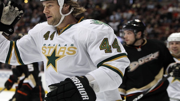 Dallas Stars' Jeff Woywitka skates off after scoring a goal against the Anaheim Ducks in the first period of an NHL hockey game in Anaheim Calif., on Sunday, April 3, 2011. (AP Photo/Christine Cotter) 