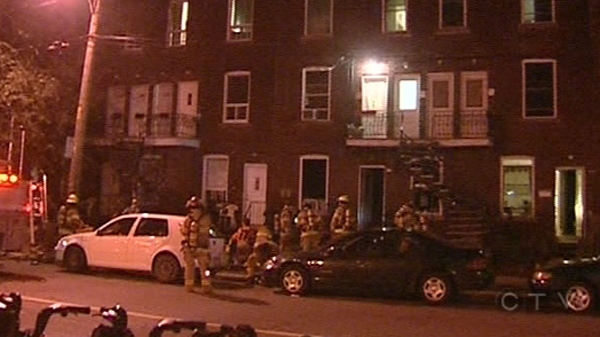 Firefighters enter the home on Rushbrooke St. where two people died (August 17, 2011)