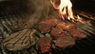 Steak sizzles on the grill of Al's Steakhouse, named Ottawa's Best Steak Friday, August 19, 2011.