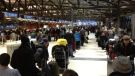 Hundreds of passengers in-line at the Ottawa Airport before dawn today. Some are here for a second or third day.