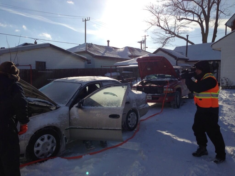 A tow truck gives a motorist a boost in London, Ont. on Tuesday, Jan. 7, 2014. (Nick Paparella / CTV London)