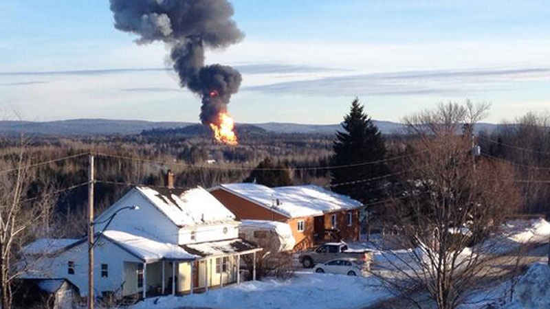 A large fireball shoots into the sky from the site of a train derailment near Plaster Rock, N.B. as officials use a controlled explosion to blast holes in three tanker cars on Jan. 10, 2014. (CTV Atlantic)