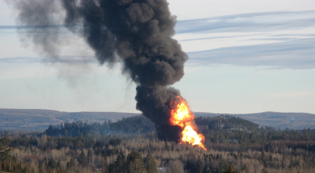 Fireball after explosion at train derailment site