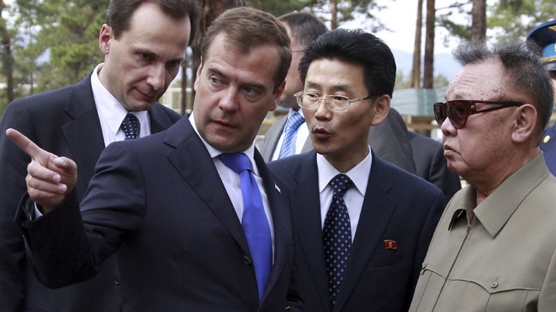 North Korean leader Kim Jong Il, right, listens to Russian President Dmitry Medvedev, second left, during a meeting at a military garrison, outside Ulan-Ude, Wednesday, Aug. 24, 2011. (AP Photo/RIA Novosti, Dmitry Astakhov, Presidential Press Service)