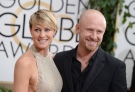Robin Wright, left, and Ben Foster arrive at the 71st annual Golden Globe Awards at the Beverly Hilton Hotel on Sunday, Jan. 12, 2014, in Beverly Hills, Calif. (Jordan Strauss / Invision)