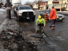 City crews repair a pothole in the Yonge and Sheppard area on Jan. 13, 2013. (Peter LeClair/CTV Toronto)