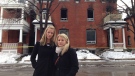 Displaced residents Jennifer White, 26, and Stephanie Thompson, 25, stand outside their burned out apartment at 544 Gilmour Street. (Photo: Zane Burtnyk, CTV Ottawa)