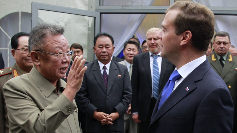 North Korean leader Kim Jong Il, left, says goodbye to Russian President Dmitry Medvedev, right, after a meeting an a military garrison, outside Ulan-Ude in Byryatia, Wednesday, Aug. 24, 2011. (AP / RIA Novosti, Dmitry Astakhov, Presidential Press Service)