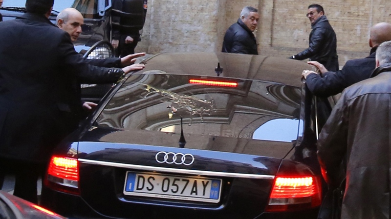 Berlusconi's vehicle pelted with eggs in Rome