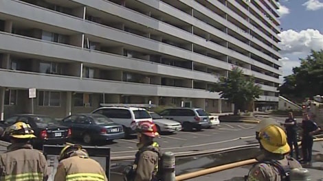 Firefighters respond to an electrical blast at a highrise apartment building on Donald Street, Monday, Aug. 29, 2011.