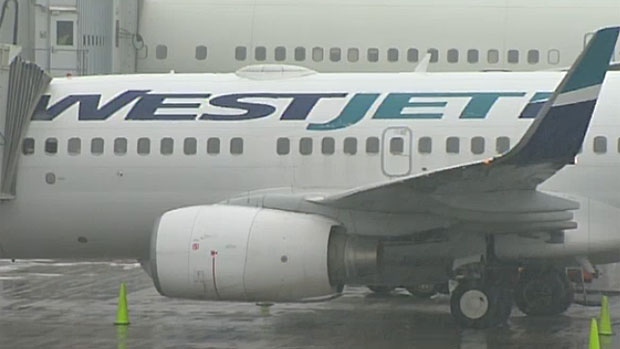 WestJet says fewer Albertans are booking flights because of the oil price slump. (File photo)
