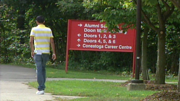 A student walks outside Conestoga College in Kitchener, Ont. on Wednesday, Aug. 31, 2011.
