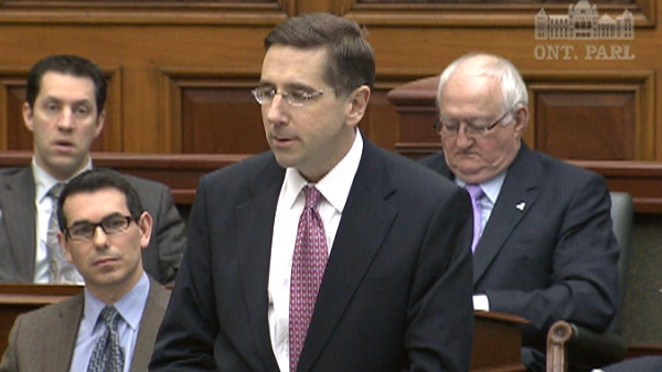 John Milloy, minister of training, colleges and universities, speaks in the Ontario Legislature on March 3, 2010. 