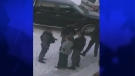 Windsor police can be seen arresting a suspect at Riverside High School in Windsor, Ont. in connection to alleged threats against a Windsor school on Thursday, Jan. 23. (Twitter/ CTV Windsor)