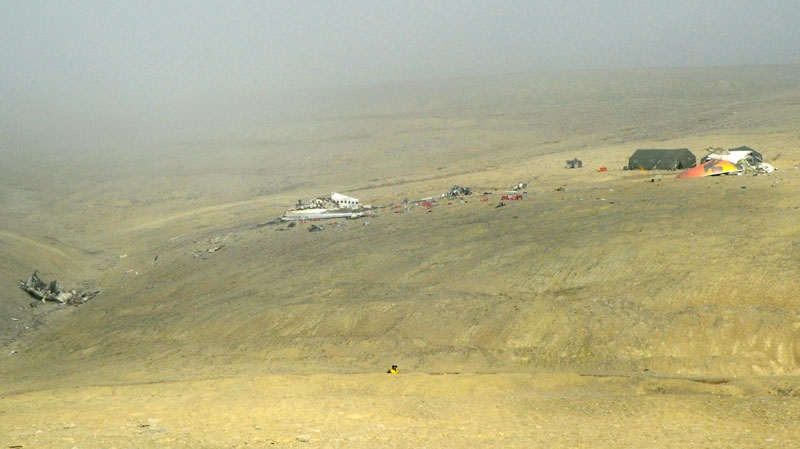 The crash site of First Air flight 6560 is viewed from the Resolute Airport in Resolute, Nunavut on Tuesday, Aug. 23, 2011. (Sean Kilpatrick / THE CANADIAN PRESS)