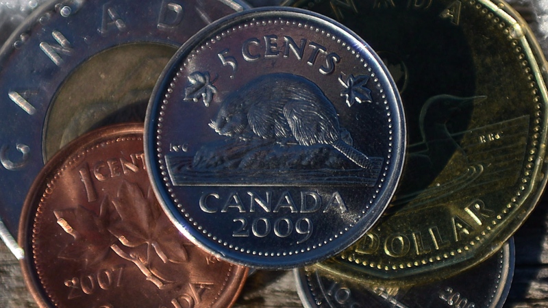 Canadian coins are pictured. (The Canadian Press/Sean Kilpatrick)