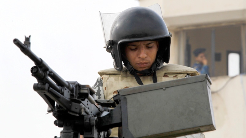 An Egyptian army soldier guards outside the court where former President Hosni Mubarak is on trial, in Cairo on Monday, Sept. 5, 2011. (AP / Dimitri Messinis)