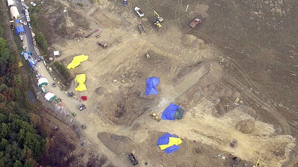 This aerial photo provided by the FBI shows the crash site of United Flight 93 near Shanksville, Pa., on Wednesday, Sept. 19, 2001. (FBI)