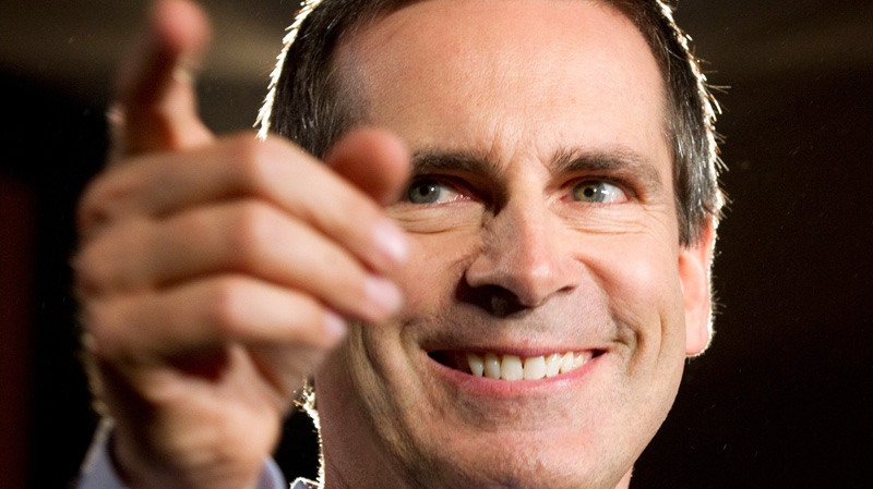 Ontario Premier Dalton McGuinty smiles as he releases the Liberal party platform at an event in Toronto on Monday Sept. 5, 2011. (Frank Gunn / THE CANADIAN PRESS)