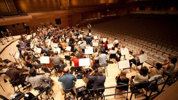 The Montreal Symphony Orchestra rehearses in its new concert hall. The musicians and the MSO reached a labour agreement just ahead of the unveiling of the new hall. Photo courtesy of Lucetg.com.