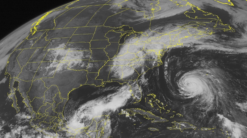 This NOAA satellite image taken Wednesday, Sept. 7, 2011 at 1:45 p.m. EDT shows widespread cloud cover over much of the Eastern Seaboard as Post Tropical Cyclone Lee lifts northward through the Mid-Atlantic. (AP PHOTO/WEATHER UNDERGROUND)