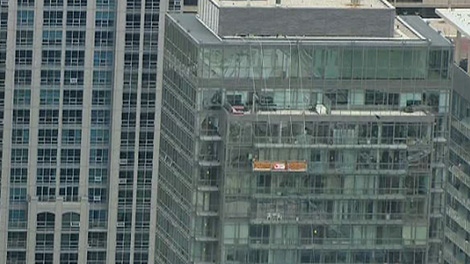 There was more falling glass from a building as workers were trying to remove glass from a balcony above.