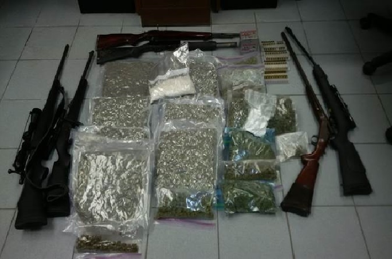 Chatham-Kent police released this undated photo of drugs and guns seized Saturday Feb. 1 in the Town of Tupperville, Ont. (CTV Windsor)