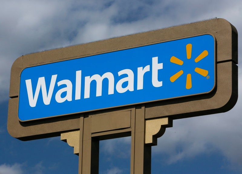 A Walmart sign is pictured in this file photo. (AP Photo/Damian Dovarganes)