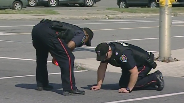 Police investigate the collision that killed a 17-year-old girl on Eagleson Road in Kanata Monday, Sept. 12, 2011.