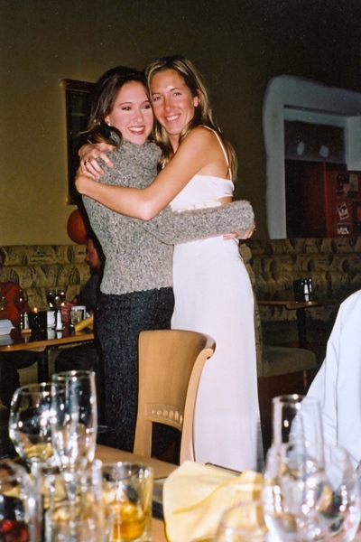 Nancy Cooper and her sister Jill Dean share an embrace.