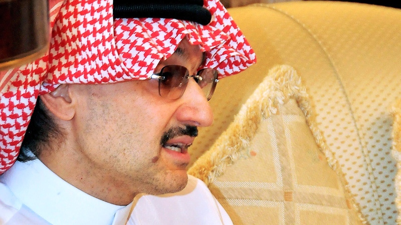 Saudi Arabia's Prince Alwaleed Bin Talal talks to journalists during a press conference in Kuwait City on Sunday, April 24, 2011. (AP / Gustavo Ferrari)