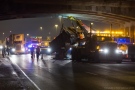 Crews remove a dump truck box that became detached from the truck in a crash in Mississauga early Friday, Feb. 14, 2014. (Tom Stefanac/CP24)