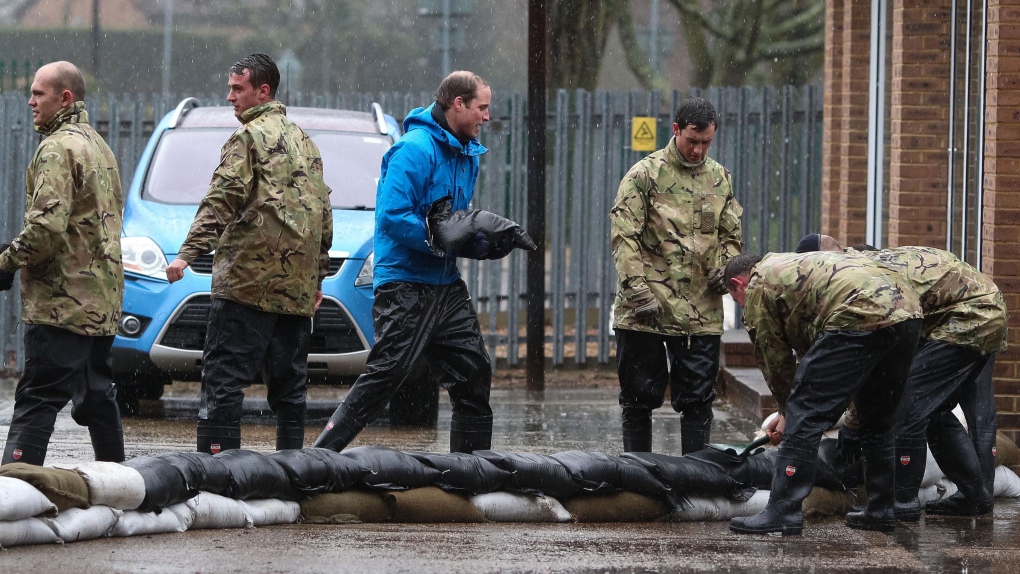 Prince William, Harry help in flood