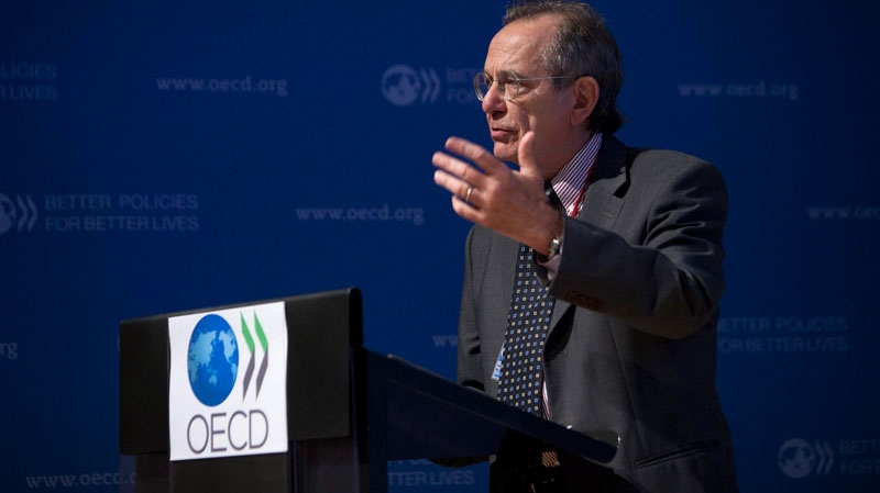 OECD Chief Economist, Pier Carlo Padoan, gestures during a press conference held at the OECD headquarters in Paris, France, Thursday Sept. 8, 2011. (AP / Thibault Camus)