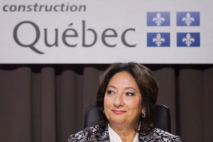 Justice France Charbonneau smiles as she sits on the opening day of a Quebec inquiry looking into allegations of corruption in the province's construction industry in Montreal, Tuesday, May 22, 2012. (Graham Hughes / THE CANADIAN PRESS)