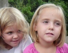 In this undated handout picture provided by the Police Cantonale Vaudoise, in Lausanne, Switzerland, showing the missing twins Alessia, left, and Livia, right, pictured at an unknown location. (AP / Keystone, POLICE CANTONALE VAUDOISE)