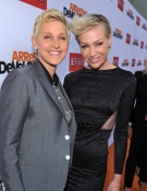 Ellen DeGeneres, left, and Portia de Rossi arrive at the season 4 premiere of "Arrested Development" at the TCL Chinese Theatre in Los Angeles.on Monday, April 29, 2013 (Photo by John Shearer/Invision/AP)