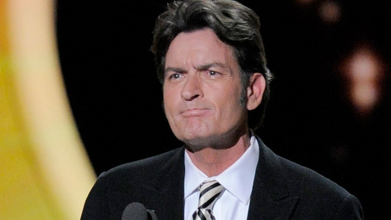 Charlie Sheen presents the award for outstanding lead actor in a comedy series at the 63rd Primetime Emmy Awards on Sunday, Sept. 18, 2011 in Los Angeles. (AP / Mark J. Terrill)