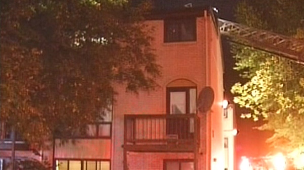 Ottawa fire crews said the fire at this Kilborn Avenue rowhouse was upgraded to a second alarm before it was extinguished Monday, Sept. 19, 2011.