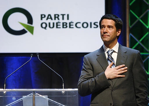 Parti Quebecois Leader Andre Boisclair takes the stage after failing to win the provincial election in Montreal Monday, March 26, 2007.  (CP / Paul Chiasson)