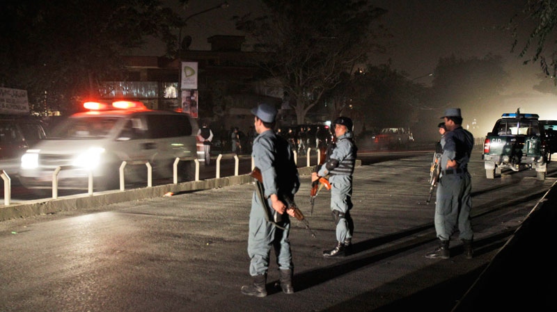 An ambulance leaves the site of a suicide attack in Kabul, Afghanistan, Tuesday Sept. 20, 2011. (AP / Kamran Jebreili)